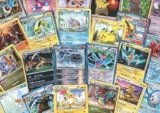 100 Assorted Pokemon Cards with Foils & Bonus Mew Promo! [Toy].